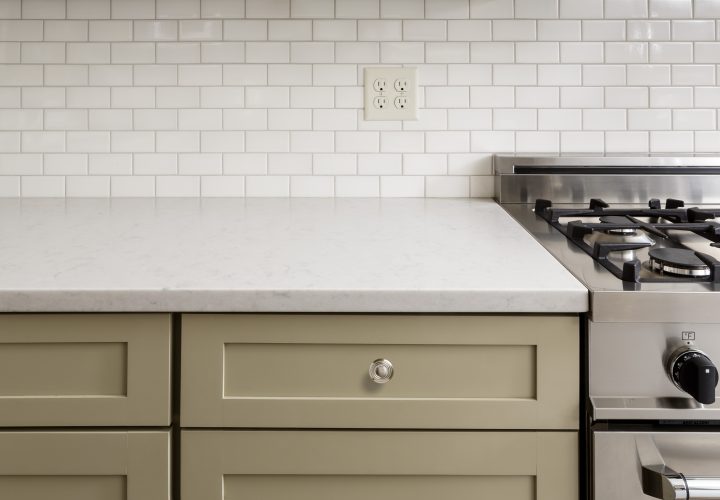 Kitchen Counter with Subway Tile, Stainless Steel oven stove, Shaker Cabinets